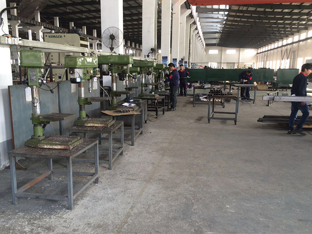 Sheet metal drilling station